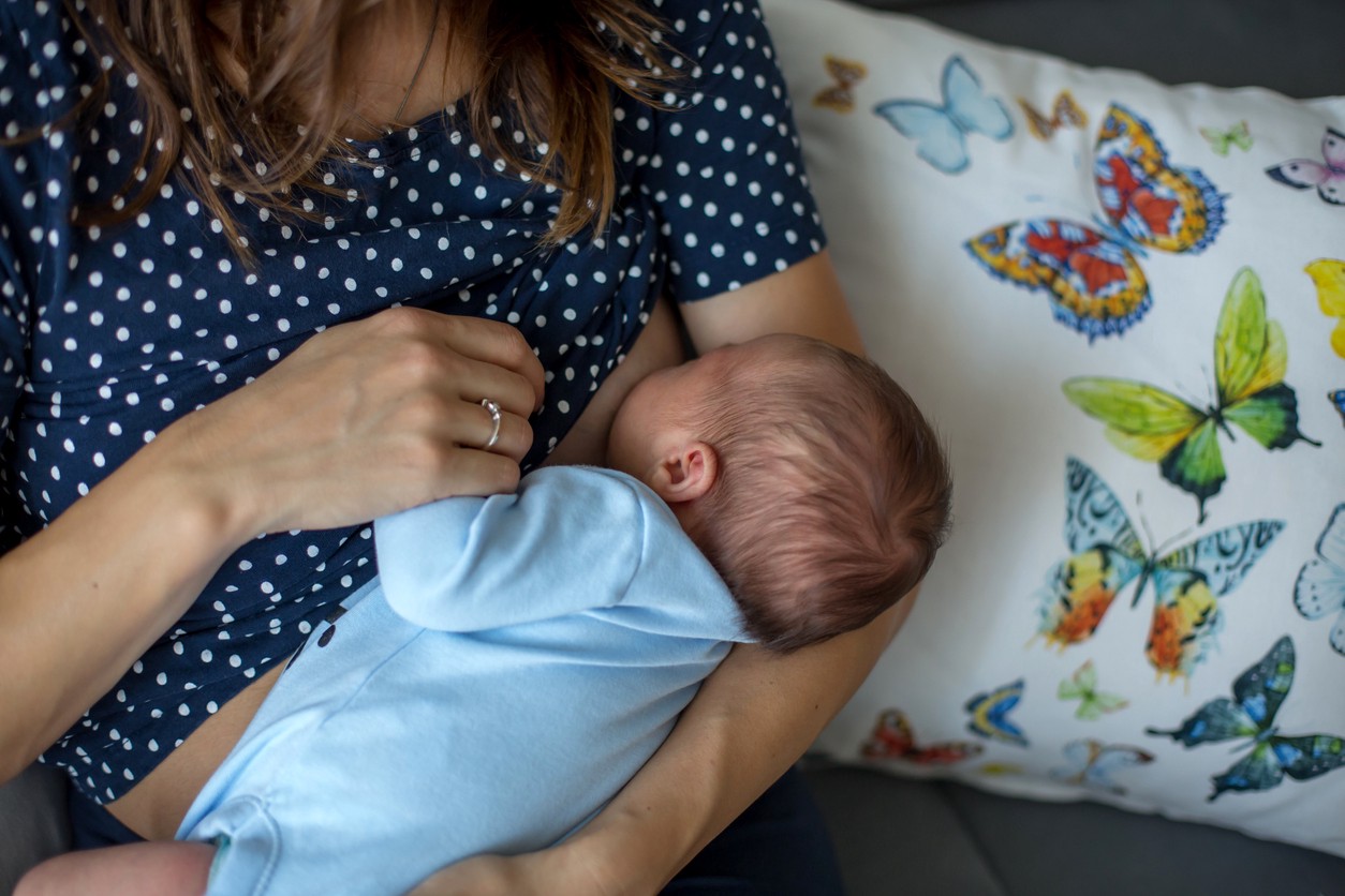 Closeup of baby breastfeeding